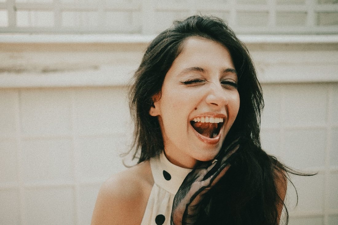 Laughing woman with dark hair