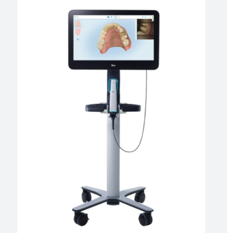 iTero Element digital scanner on rolling stand showing a 3D tooth scan